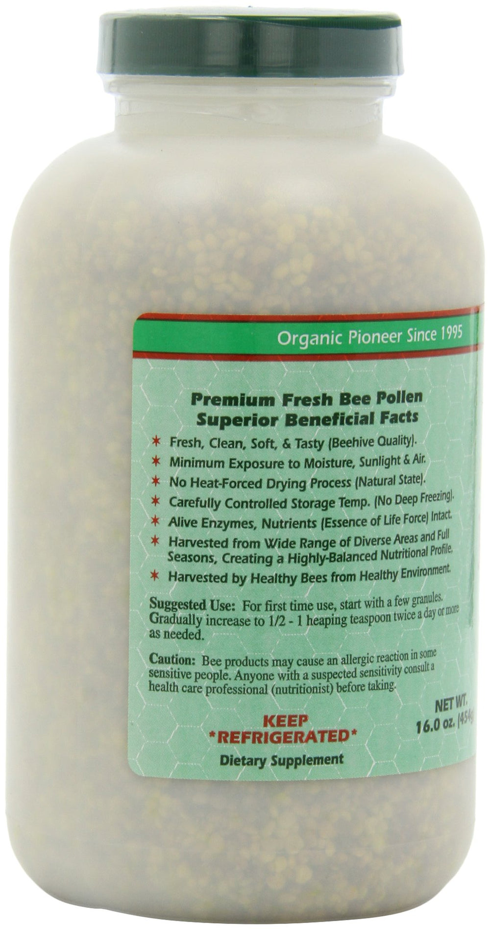 Bee pollen granules scattered on wood surface