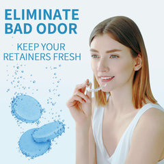 Dissolving tablet in warm water for denture cleaning