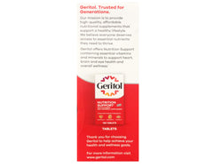 Geritol Liquid dosing cup beside the bottle enables accurate daily intake.