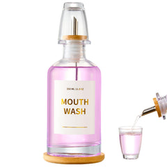 Clear glass mouthwash bottle with 11.8oz capacity