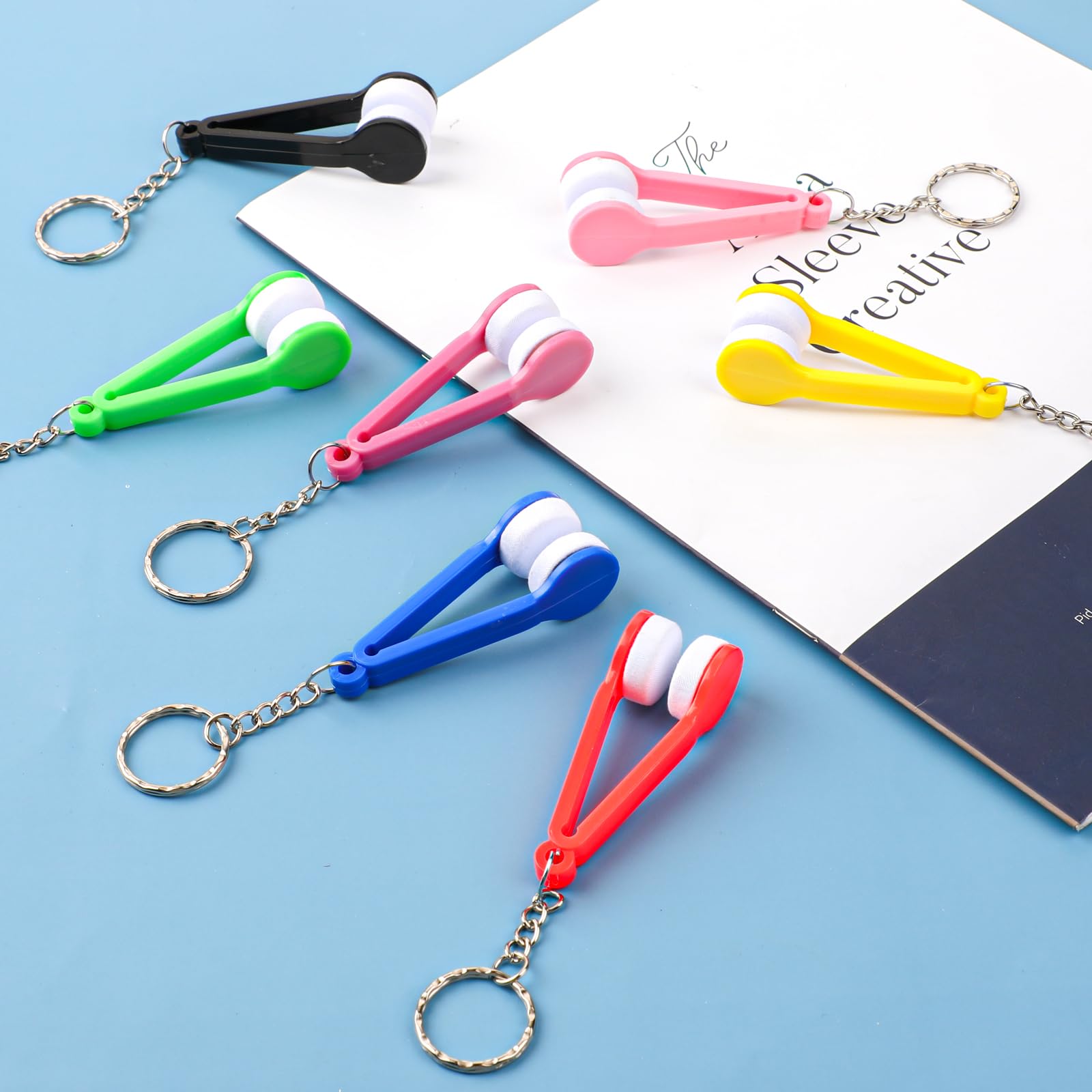 Packaging image showing 7 color glasses cleaning keychains
