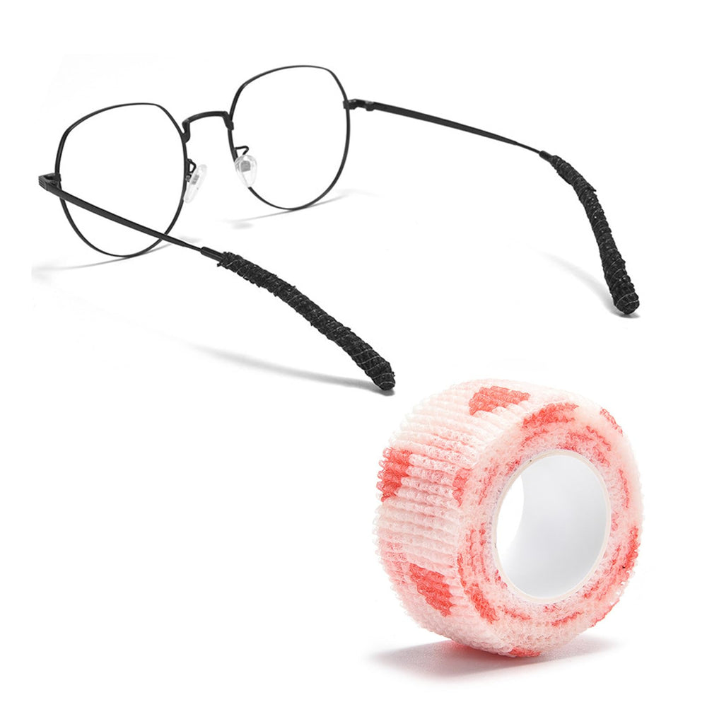 Close-up of glasses ear cushion bandage applied to temple tip