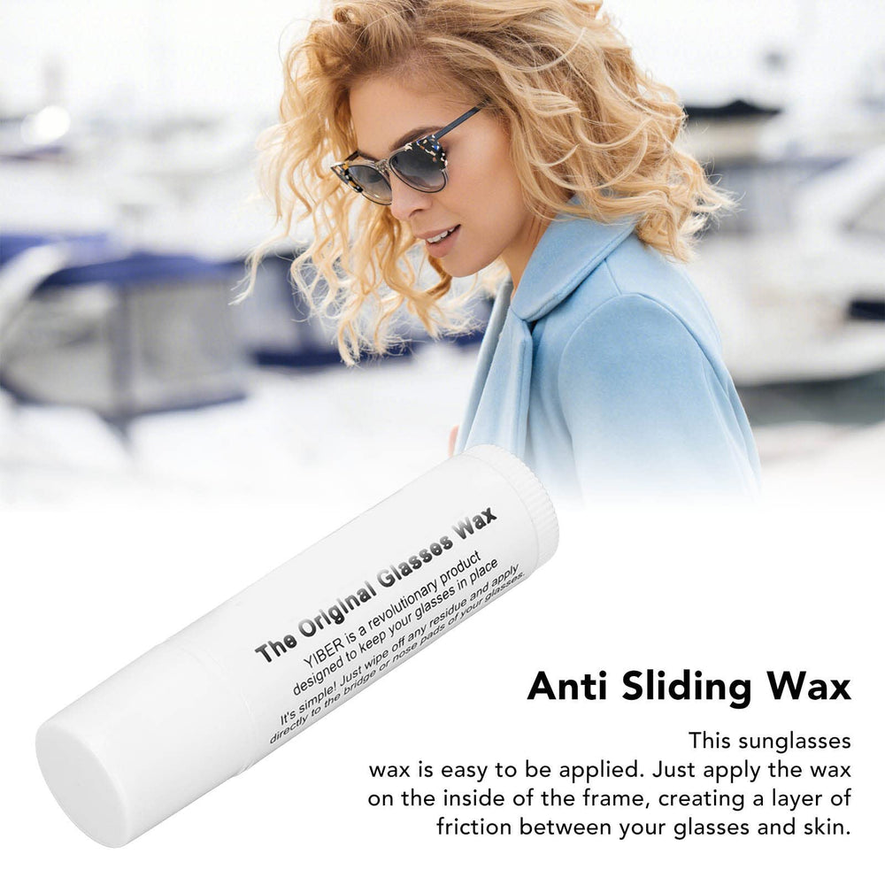 Close-up of the applicator applying wax to the inside of an eyeglass frame