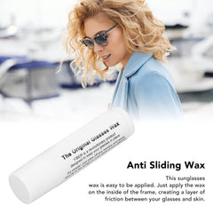 Close-up of the applicator applying wax to the inside of an eyeglass frame