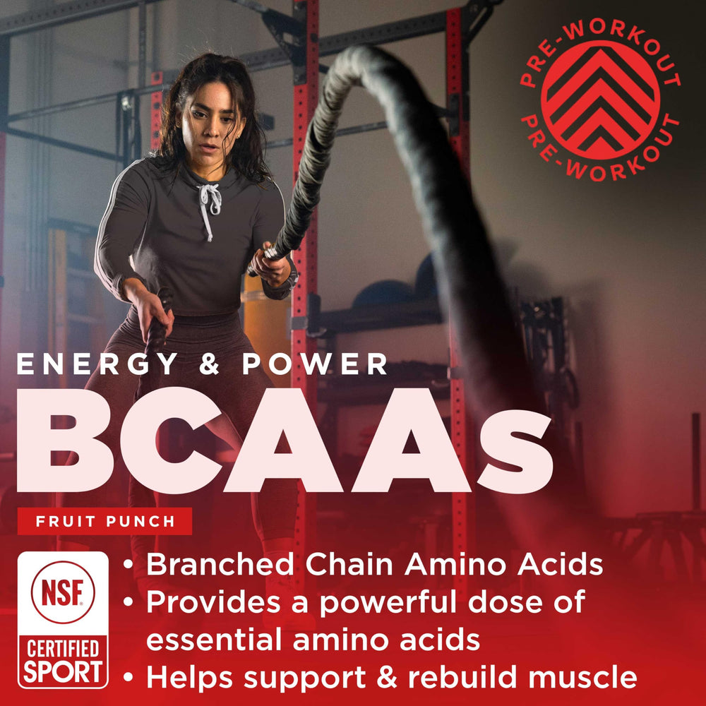 Open canister with scoop of BCAA powder