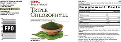 Pouring GNC Triple Chlorophyll softgels for a convenient daily intake.