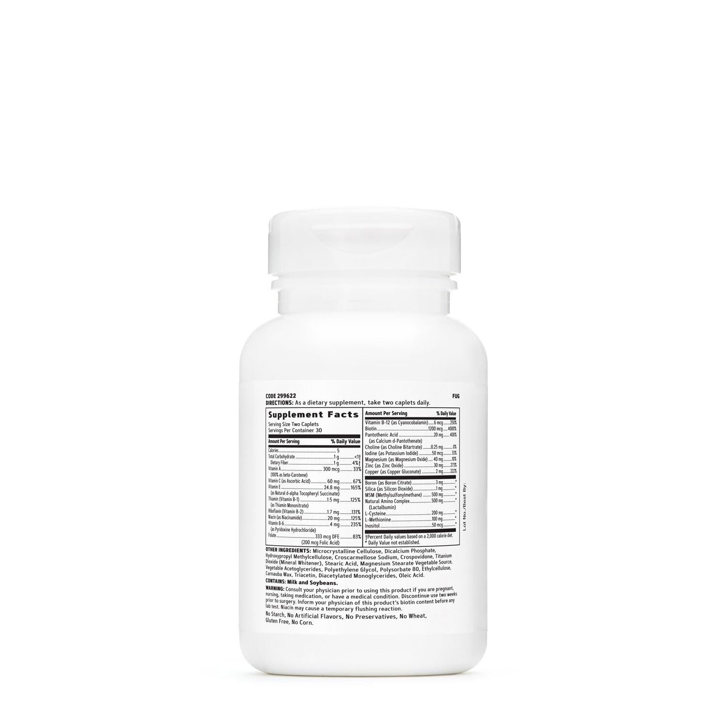 Close-up of GNC NourishHair vitamins capsule bottle with label details