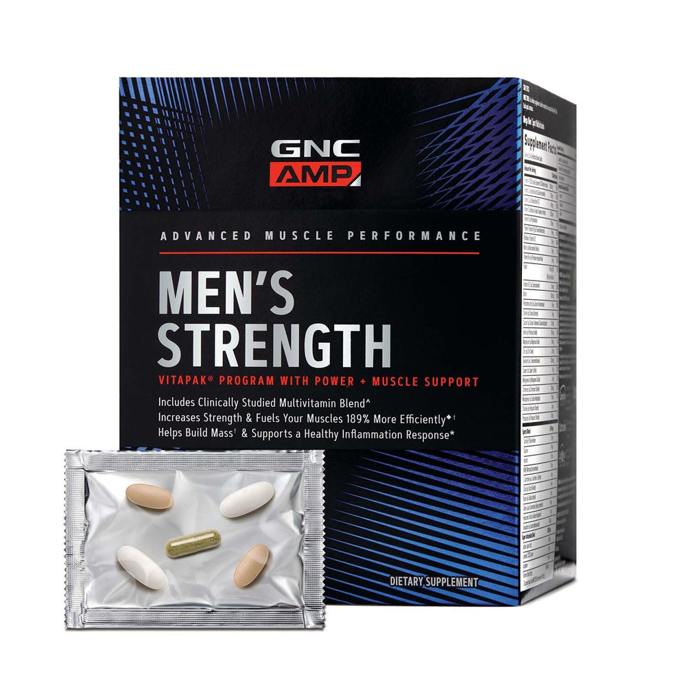 GNC AMP Men’s Strength Vitapak Program bottle and packaging on desk
