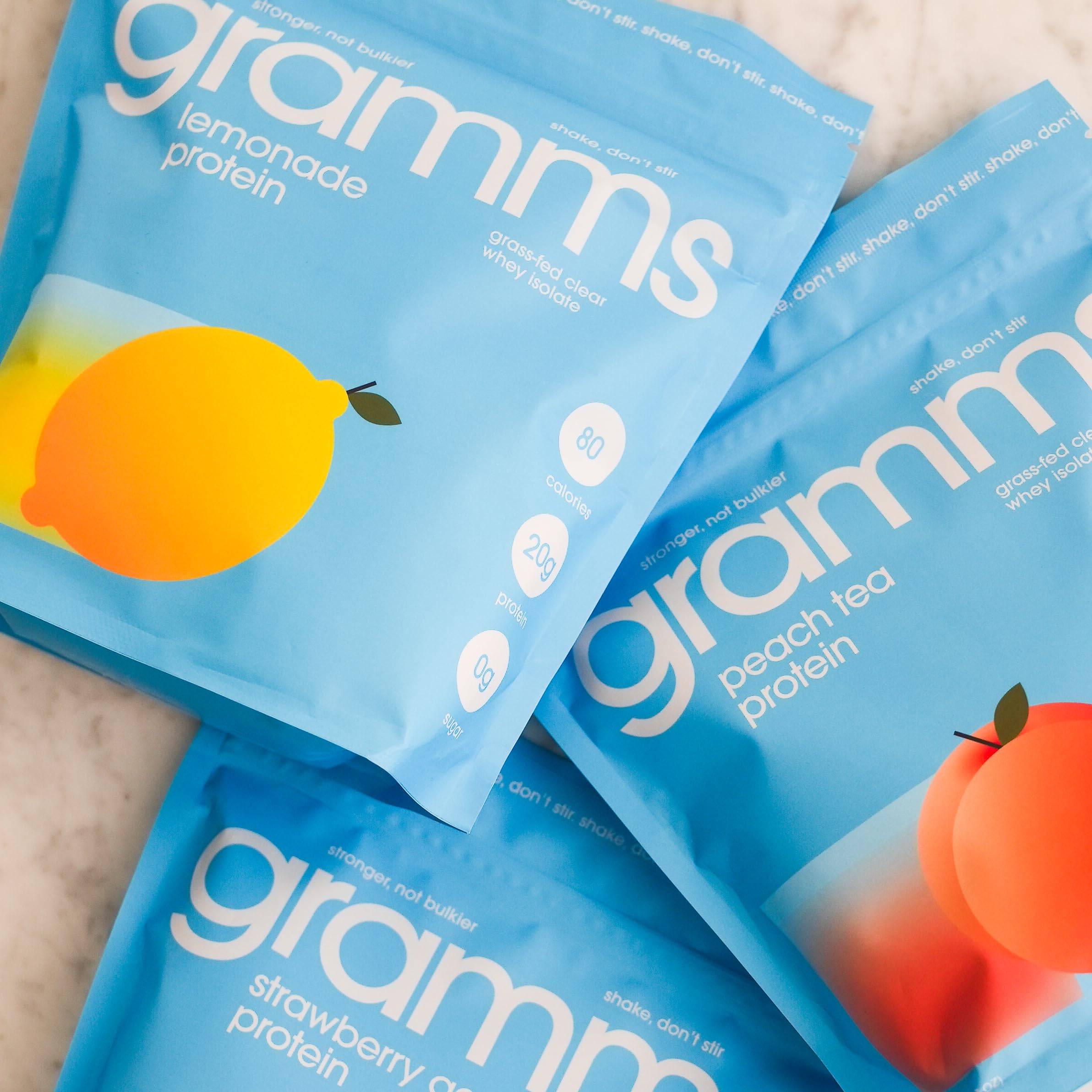 GRAMMS Clear Protein Powder bottle and packaging