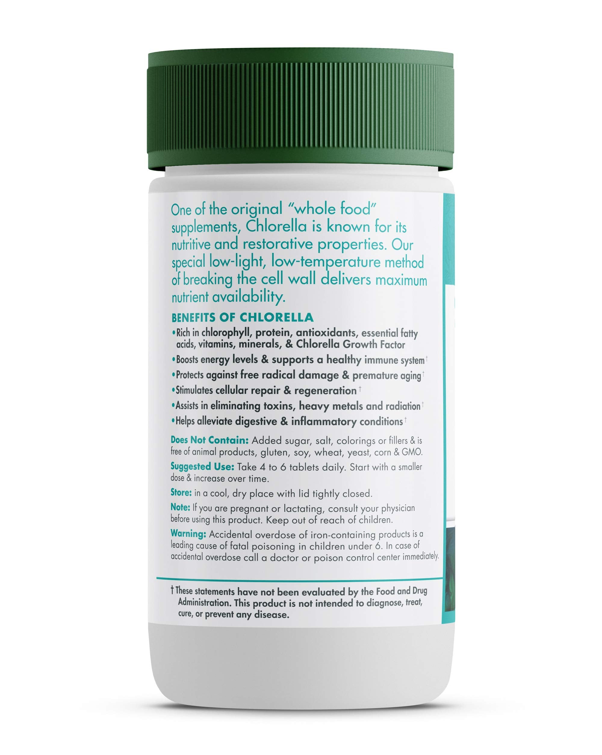 Close-up of chlorella tablets in bottle