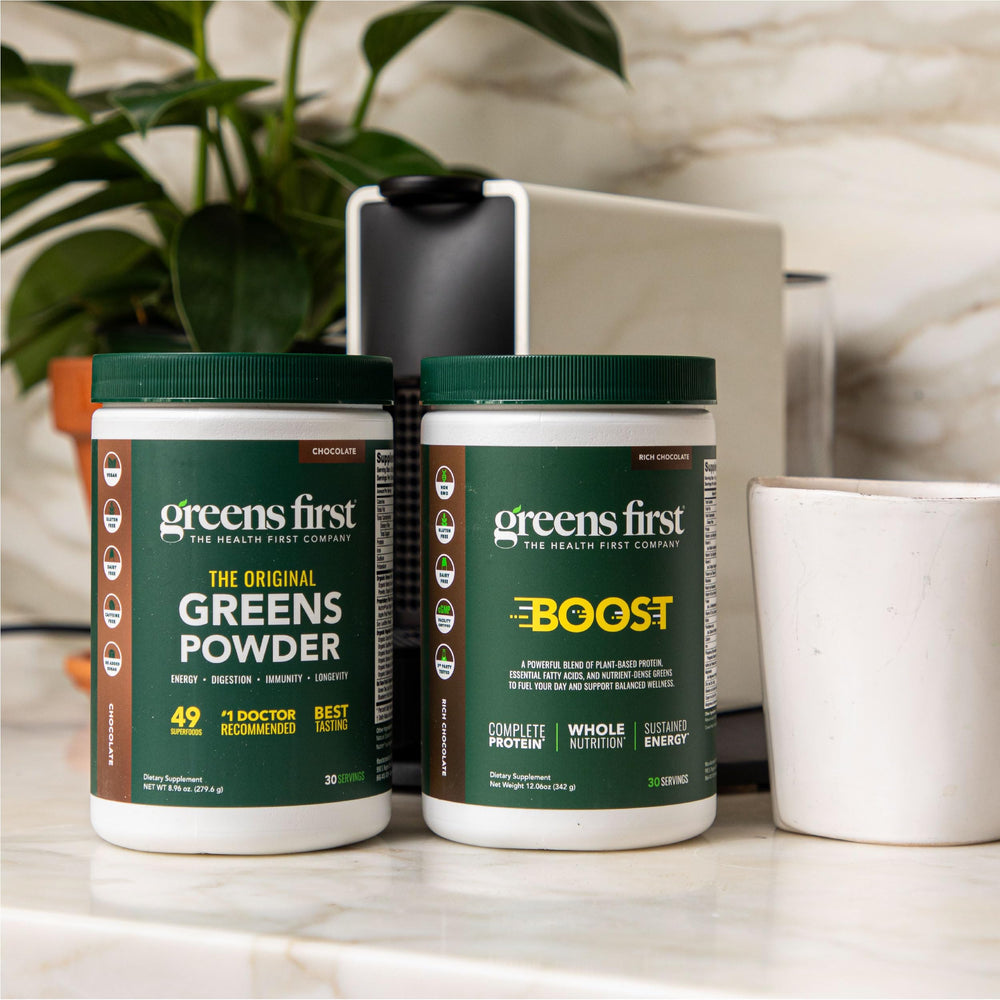 Greens First Boost ingredient close-up features non-GMO brown rice and pea protein.