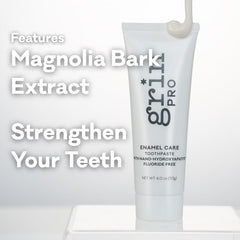 Grin Pro Enamel Care packaging next to toothpaste tube on white background