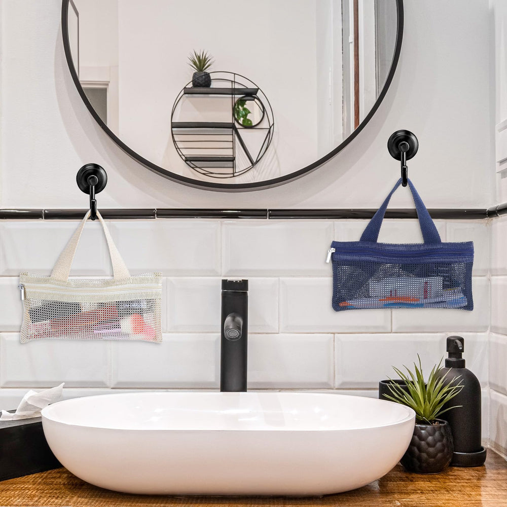 Mesh travel toothbrush pouches in white and navy