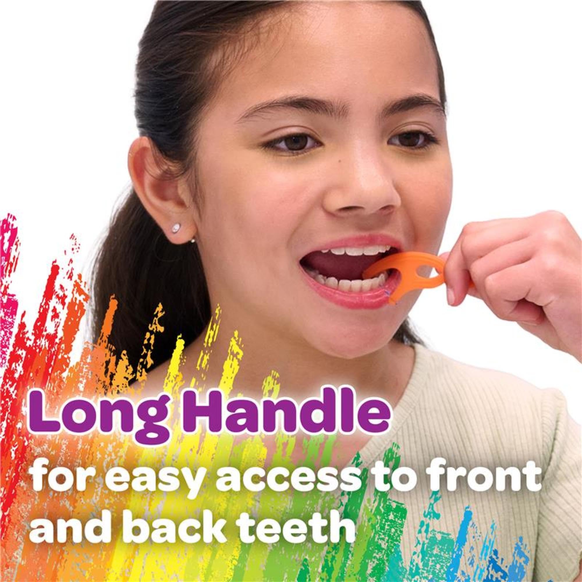 Child holding the ergonomic twistable flossers