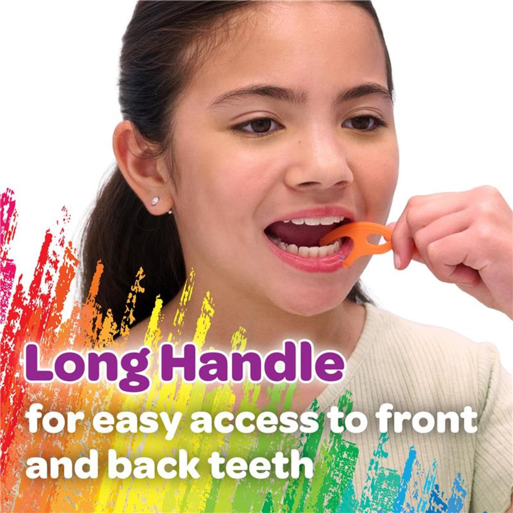 Child holding the ergonomic twistable flossers