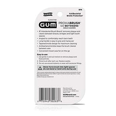 Reusable floss brush with protective travel cap for between-teeth cleaning
