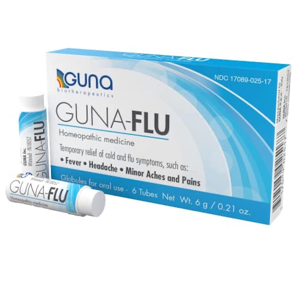 GUNA Flu tubes on table—portable relief for flu-like symptoms during travel.