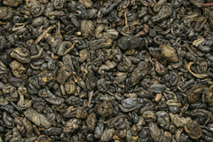 Steeping gunpowder green tea producing a golden liquor