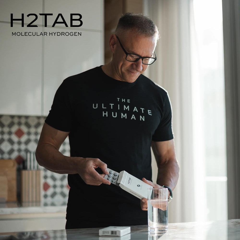 Athlete hydrating with H2TAB after a workout session.