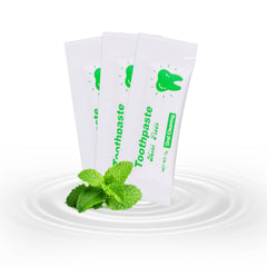 50-pack bulk travel toothpaste tubes in white kraft bag