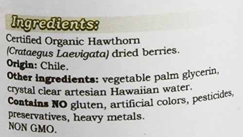 Close-up of Hawthorn tincture bottle and dried Hawthorn berries