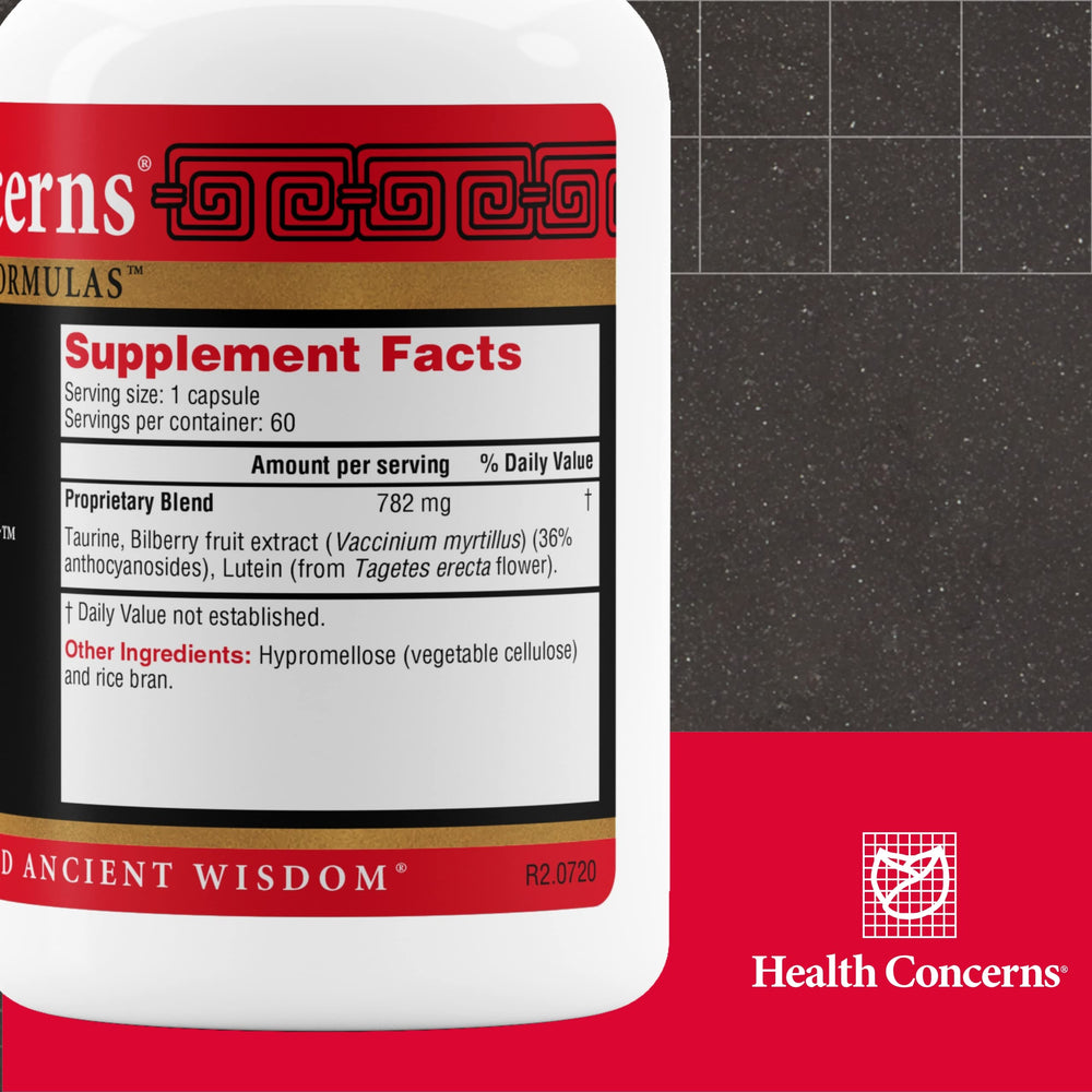 Close-up of bilberry extract and lutein capsules for eye health