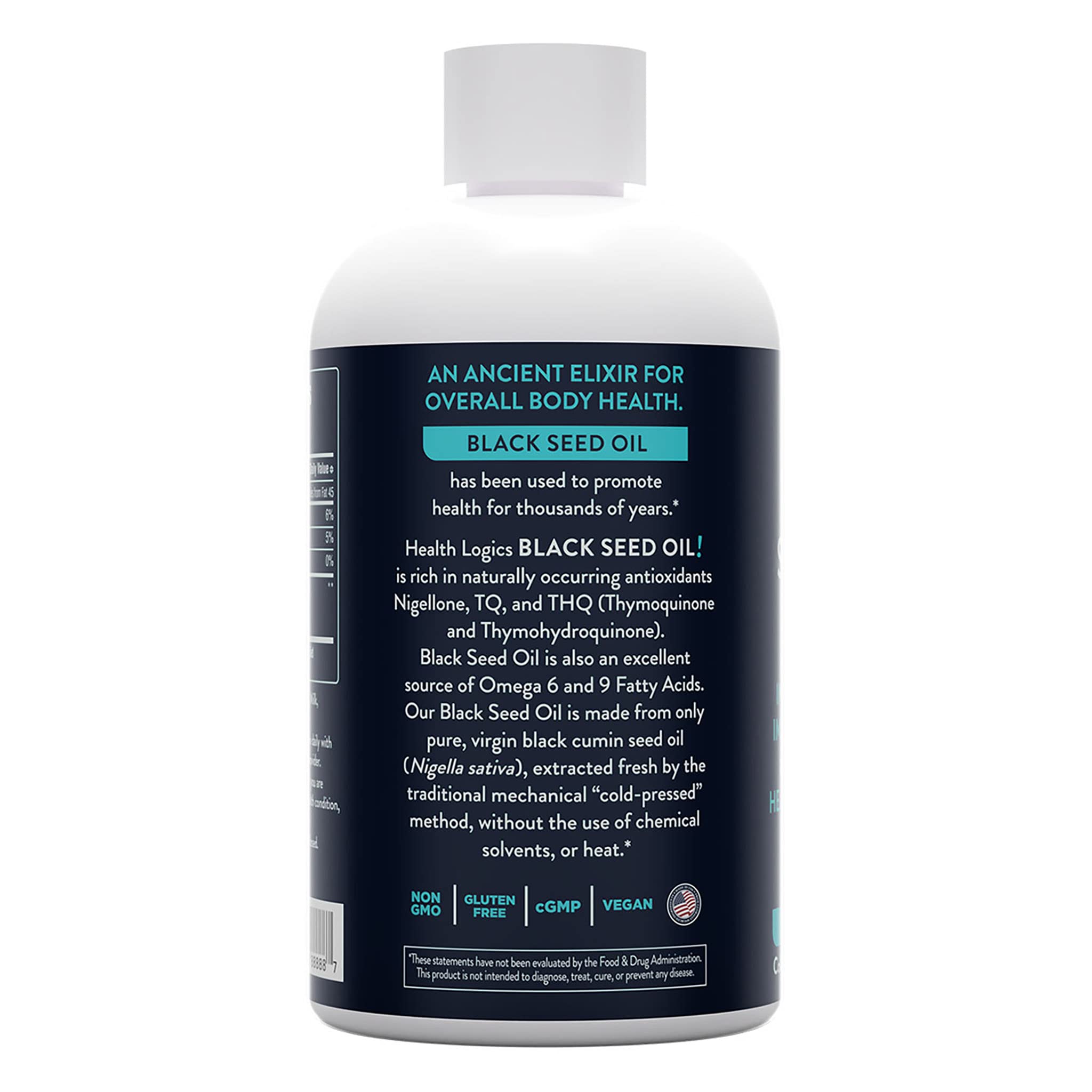 Dropper dispensing black seed oil into a spoon