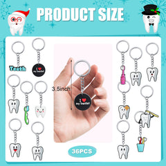 Tooth and toothbrush themed keychains displayed together