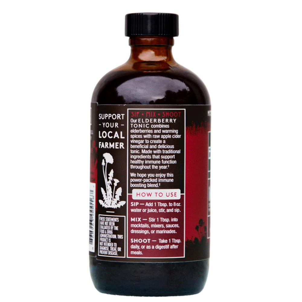 8 oz glass bottle of Elderberry Tonic showing golden color