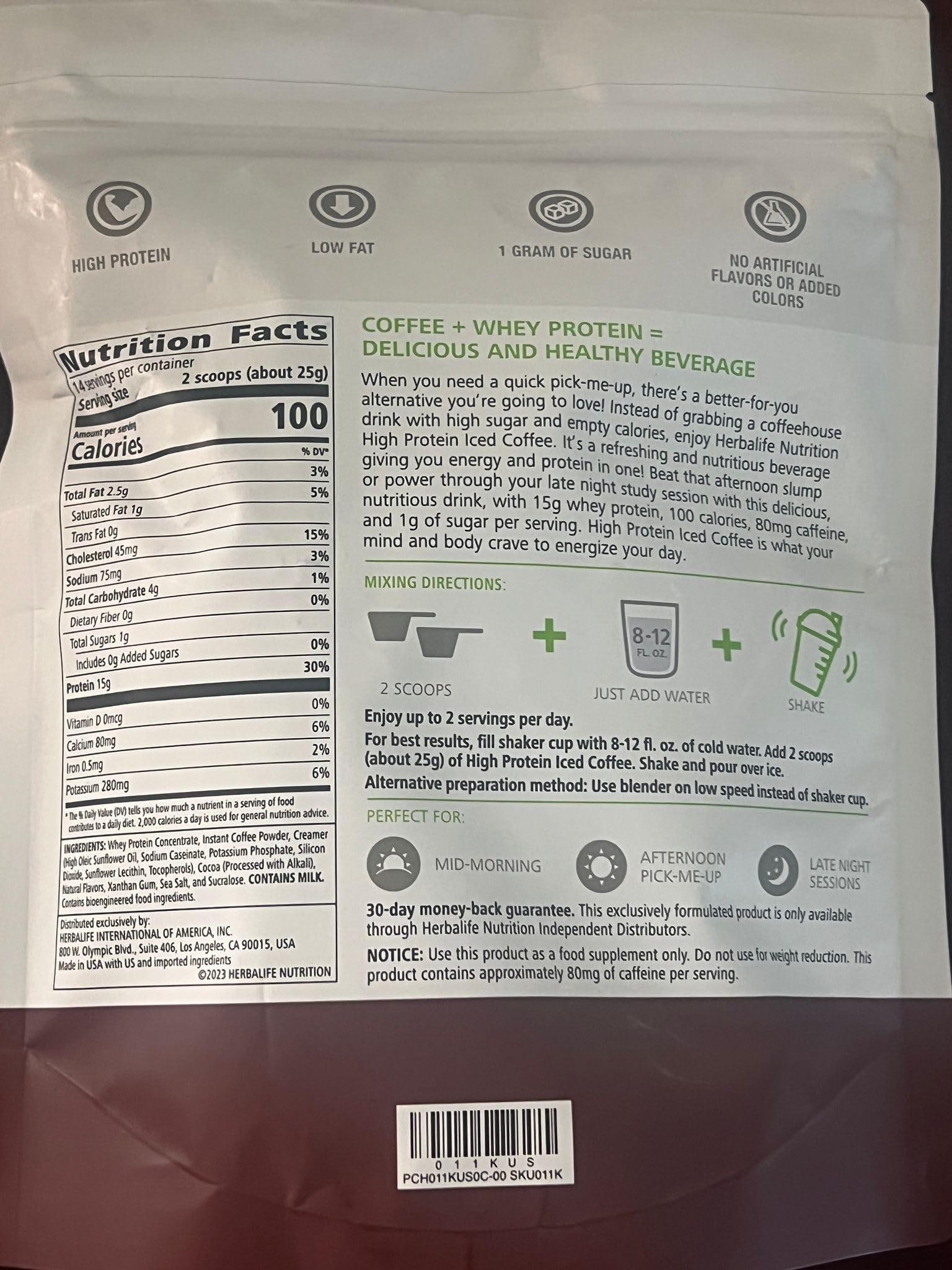 Pouring Herbalife High Protein Iced Coffee Mocha into a glass