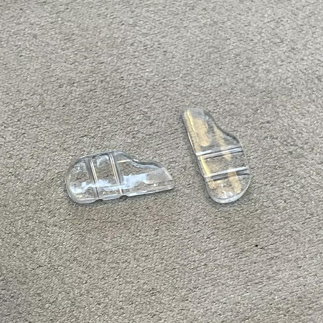 Two pairs of Tag Heuer nose pads included