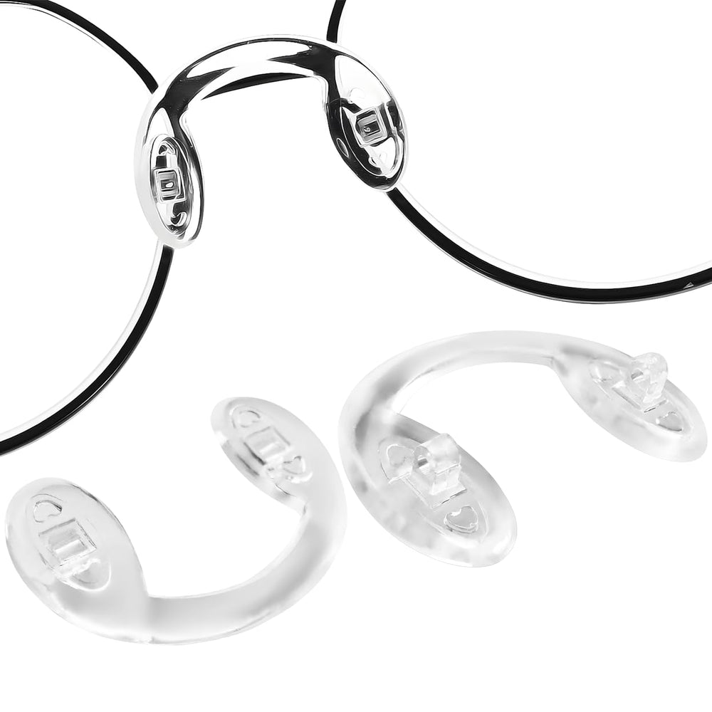 Close-up of U-shaped screw-in nose pads for Oakley sunglasses