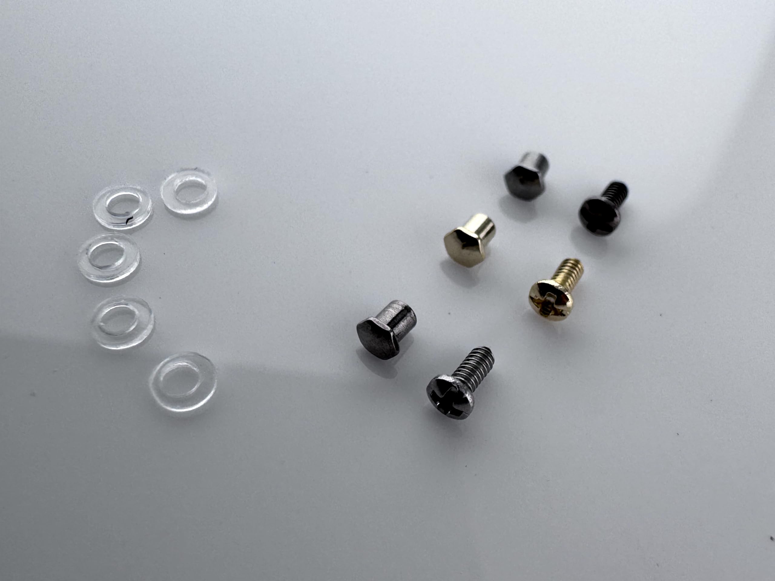 Prada eyeglasses screw kit packaging and components