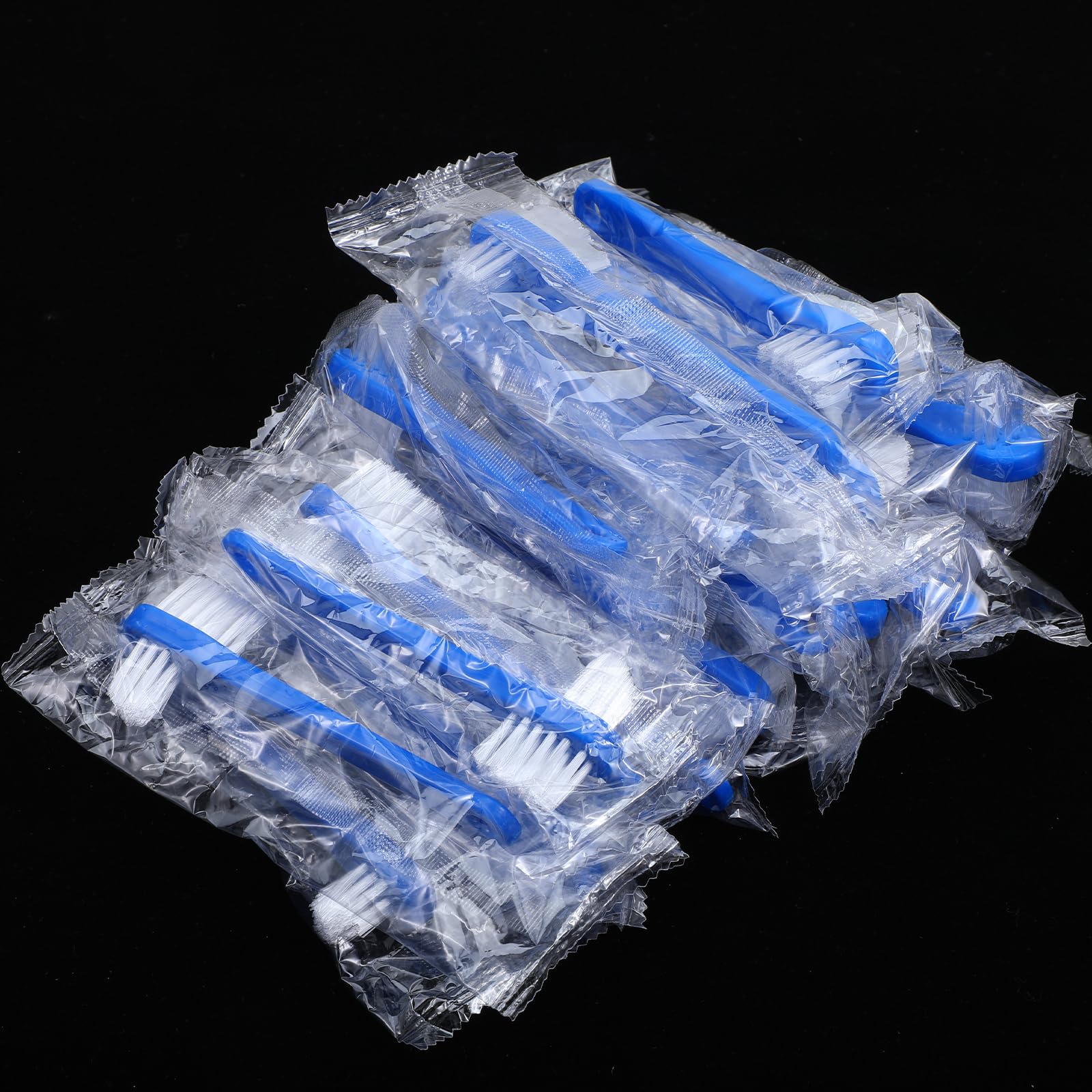 Denture brush being used to clean braces and retainers