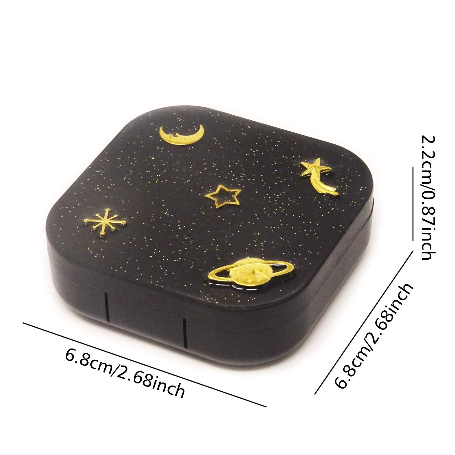 Inside view of lens case with tweezer and applicator