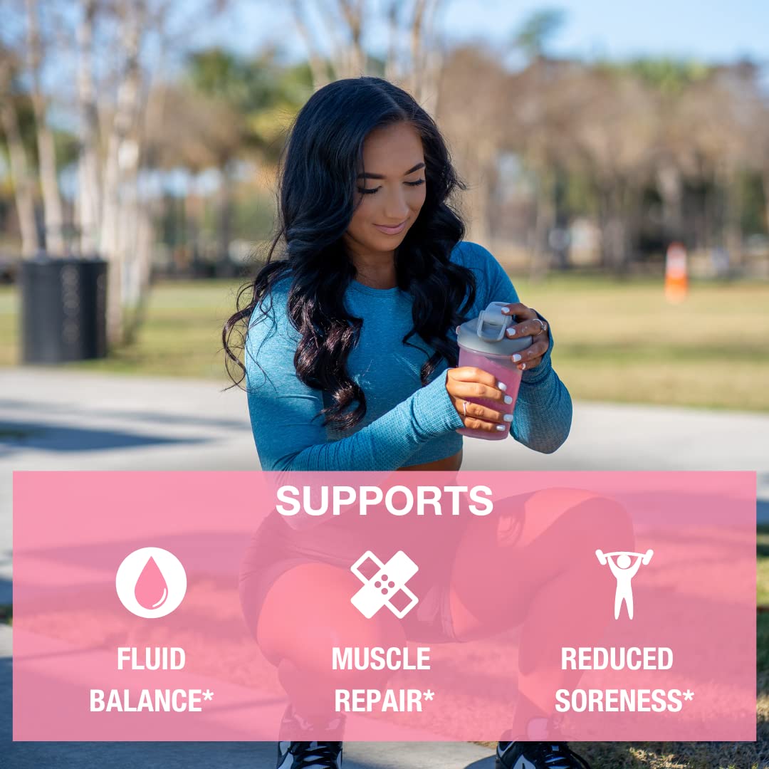 Pouring Honey Badger BCAA + EAA powder into a glass for hydration