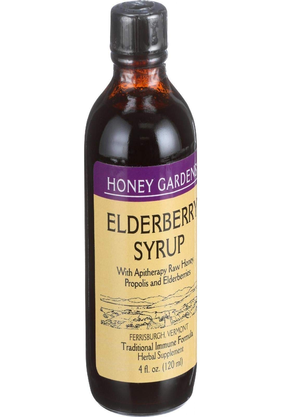 Close-up of Elderberry Honey Syrup bottle with ingredients