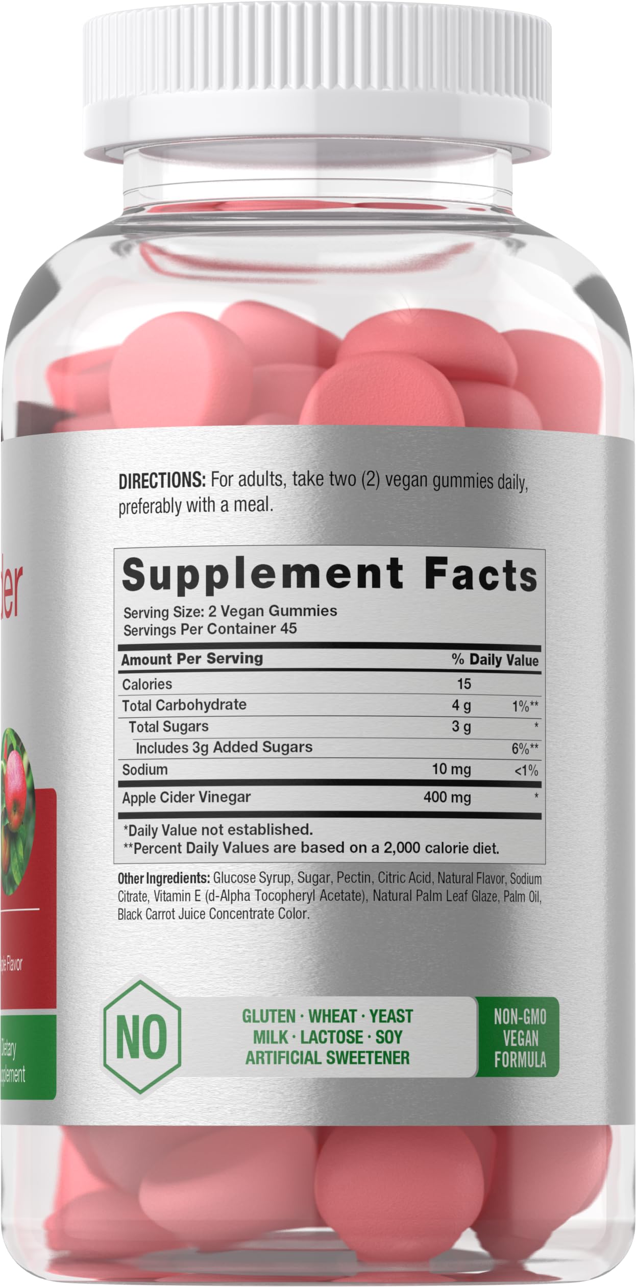 Apple-flavored vegan ACV gummies spilled from bottle