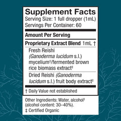 Close-up of Reishi extract dropper dispensing liquid