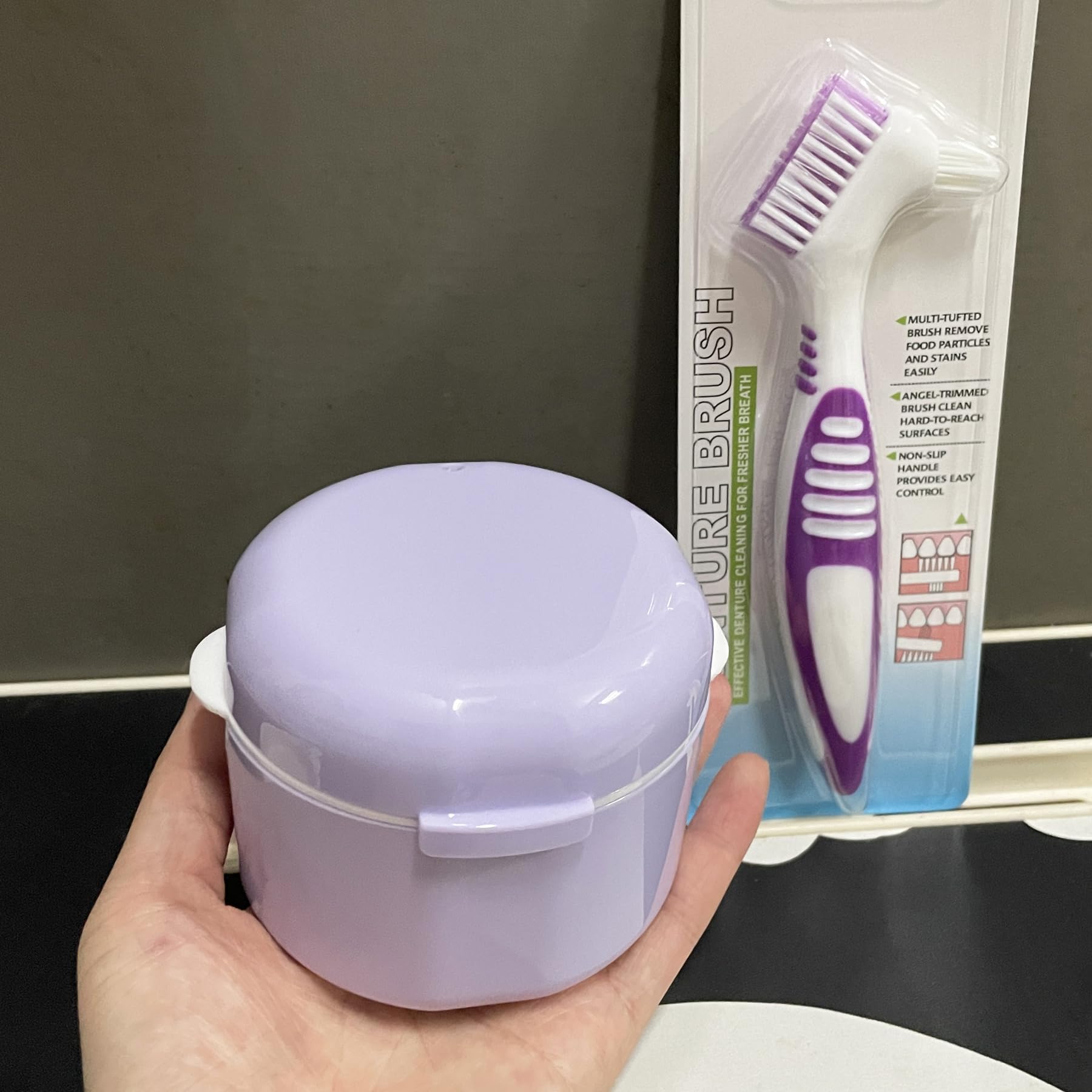 Close-up of denture case with strainer basket and compact design