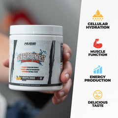 Huge Supplements Electrolytes powder pineapple mango glass highlights refreshing, zero-calorie hydration.