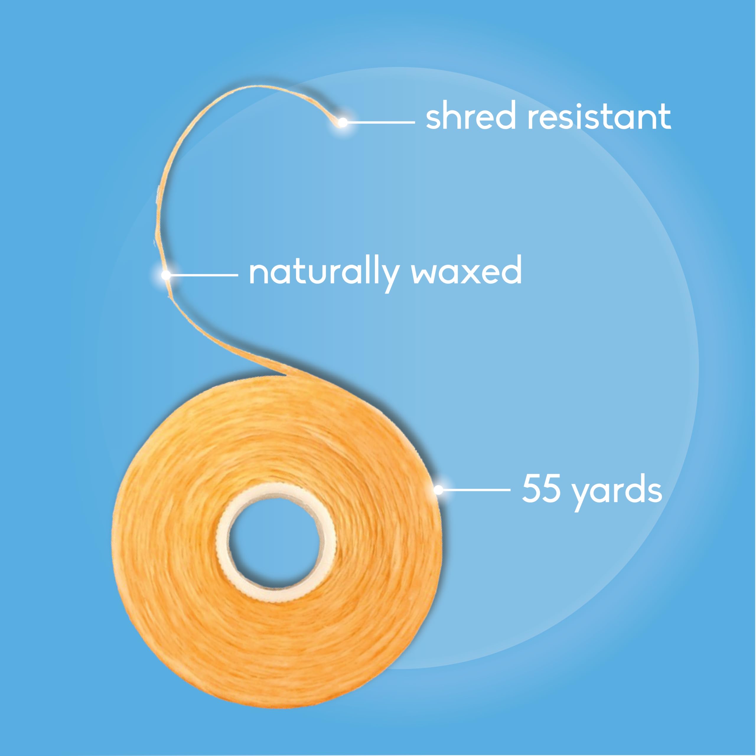 Close-up of waxed vegan floss threads in Cinnamon flavor
