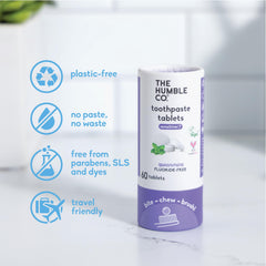 Toothpaste tablets ready to chew with toothbrush