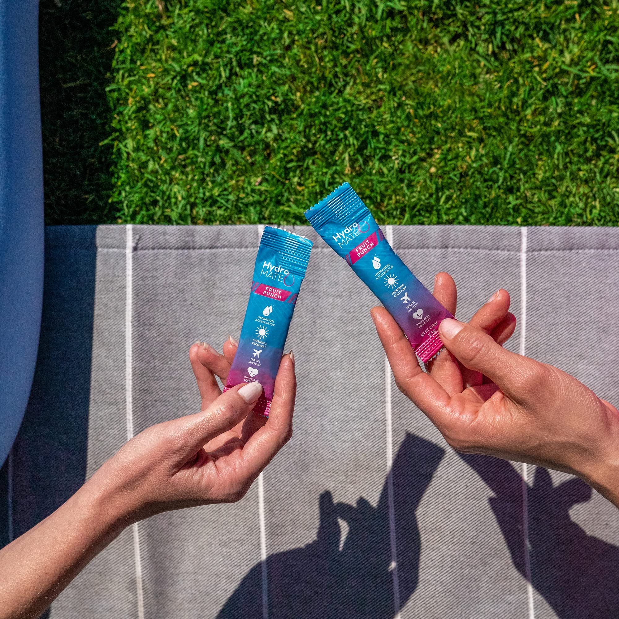 Close-up of HydroMATE Fruit Punch electrolyte packets