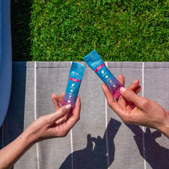 Close-up of HydroMATE Fruit Punch electrolyte packets