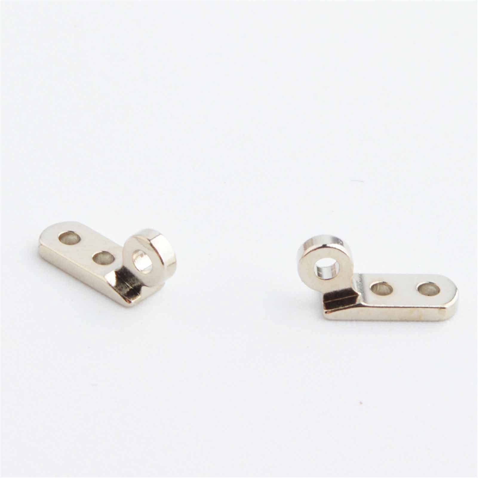 Disassembled hinge showing screw holes