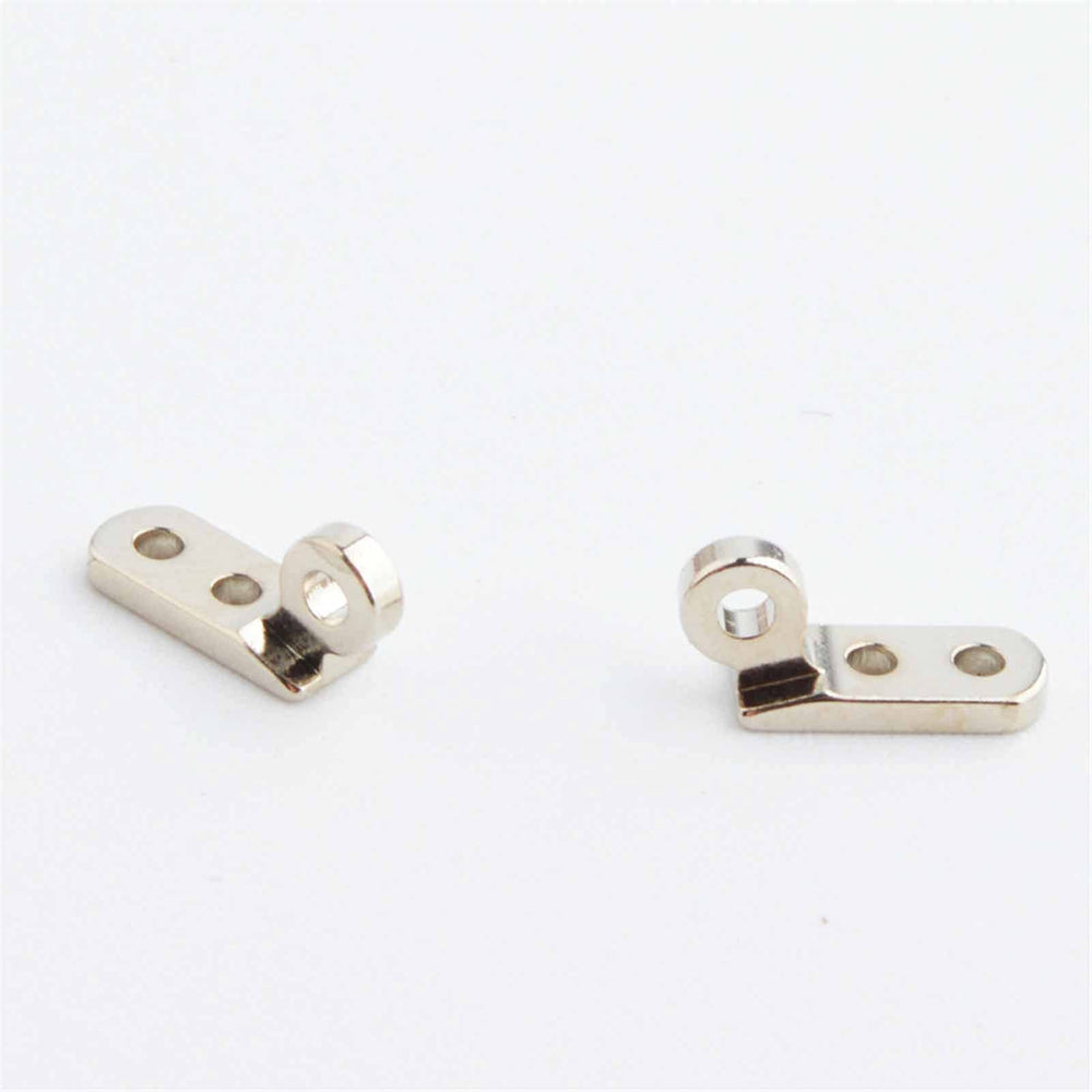 Disassembled hinge showing screw holes