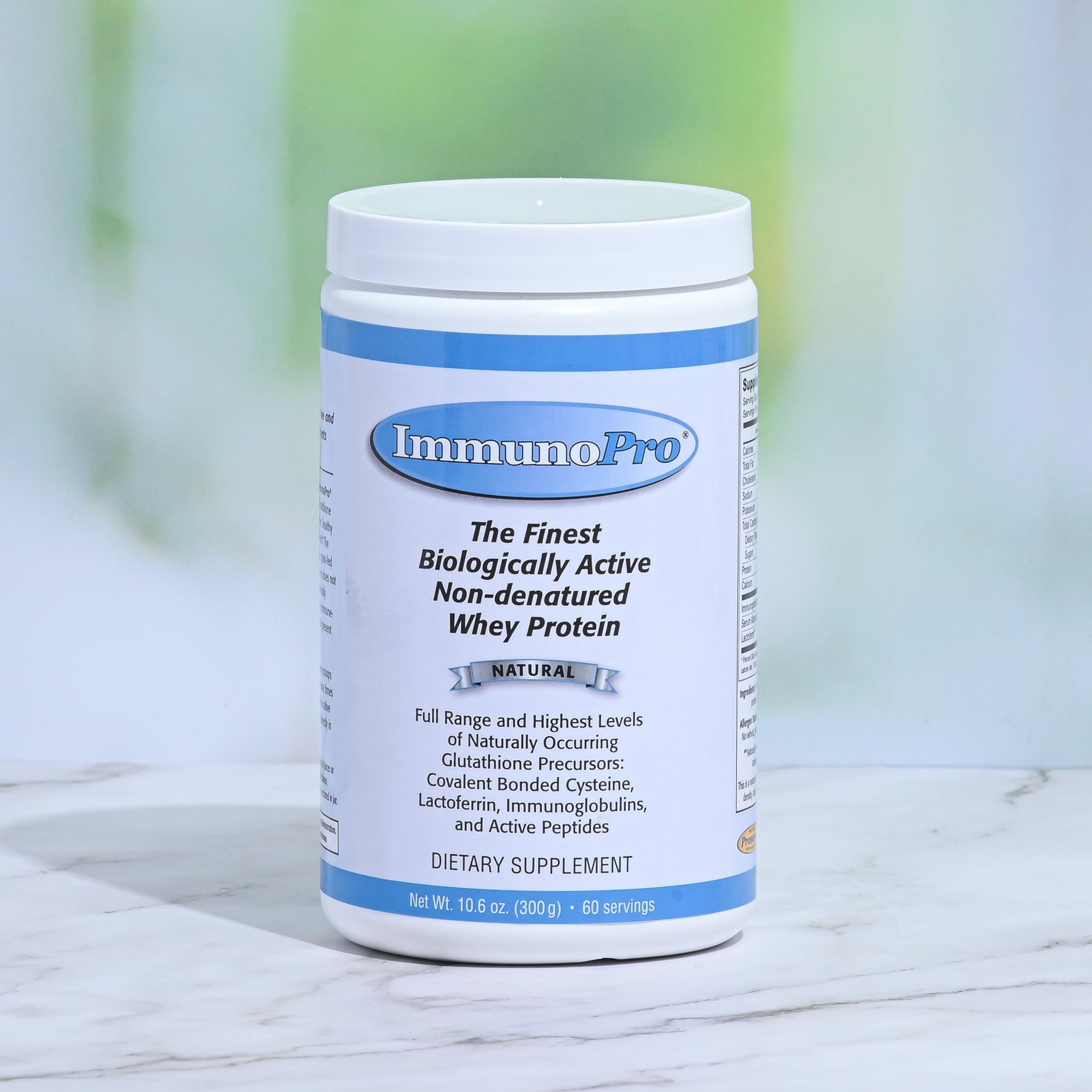 Finished ImmunoPro grass-fed whey protein powder on white background
