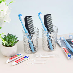 Individually wrapped travel toothbrushes