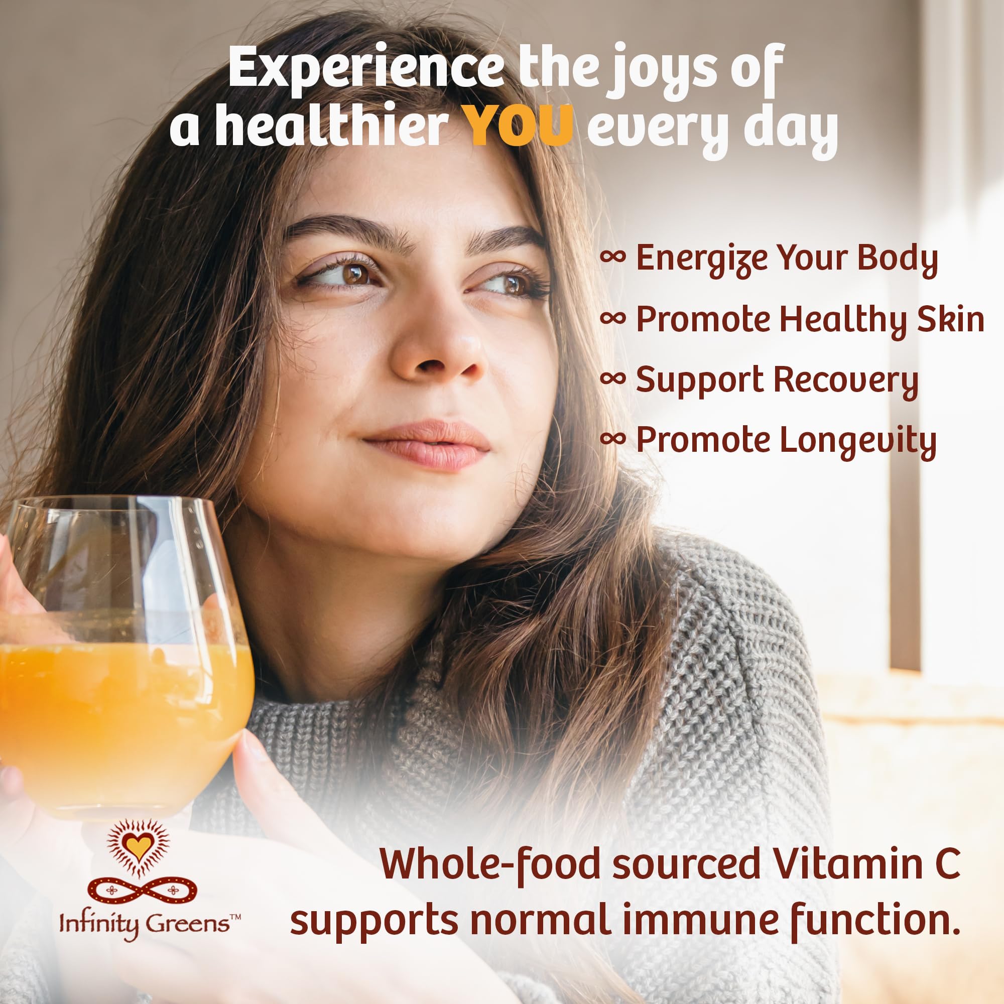 Scoop of Infinity-C Vitamin C Powder over a glass of water